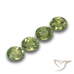 Pedras preciosas de Granada demantóide verde quente natural de 1.12 ct, oval, VS