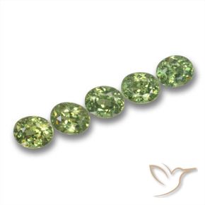 Pedras preciosas de Granada demantóide verde quente natural de 1.82 ct, oval, VS