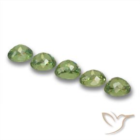 Pedras preciosas de Granada demantóide verde quente natural de 1.82 ct, oval, VS