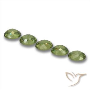Pedras preciosas de Granada demantóide verde quente natural de 1.96 ct, oval, VS