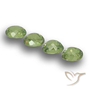 Pedras preciosas de Granada demantóide verde quente natural de 1.52 ct, oval, VS
