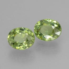 Pedras preciosas de granada demantoide verde quente natural de 0,86 ct, corte oval, VS