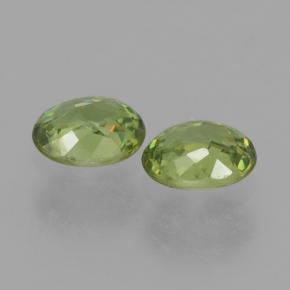Pedras preciosas de granada demantoide verde quente natural de 0,86 ct, corte oval, VS