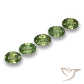 Pedras preciosas de Granada demantóide verde quente natural de 1.53 ct, oval, VS