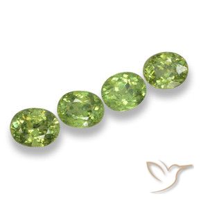 Pedras preciosas de Granada demantóide verde quente natural de 2.03 ct, oval, VS