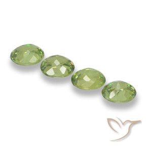 Pedras preciosas de Granada demantóide verde quente natural de 1.90 ct, oval, VS