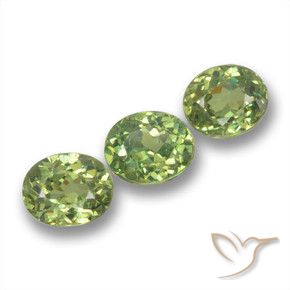Pedras preciosas de Granada demantóide verde quente natural de 1.43 ct, oval, VS