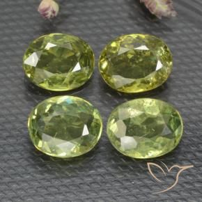 Pedras preciosas de Granada demantóide verde quente natural de 1.43 ct, oval, VS