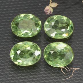 Pedras preciosas de Granada demantóide verde quente natural de 1.51 ct, oval, VS