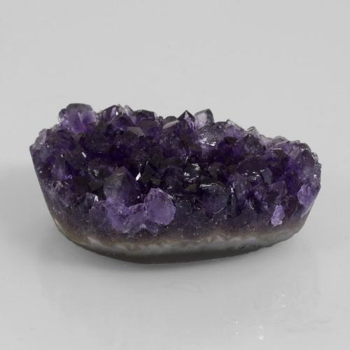 Drusa de ametista violeta natural 79,16ct, forma extravagante, opaco