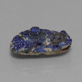 Drusa de azurita azul natural 6,58ct, forma extravagante, opaco