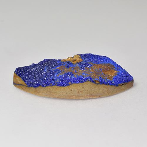 Drusa de azurita azul natural 6,76ct, marquise, opaco