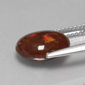 Opala de fogo multicolorido natural 2,78ct, corte oval, opaco