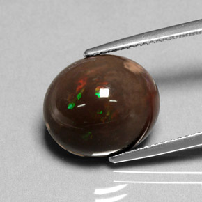 Opala de fogo multicolorido natural 7,95ct, corte oval, opaco