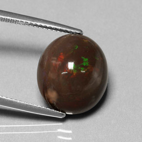 Opala de fogo multicolorido natural 7,95ct, corte oval, opaco
