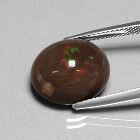 Opala de fogo multicolorido natural 7,95ct, corte oval, opaco
