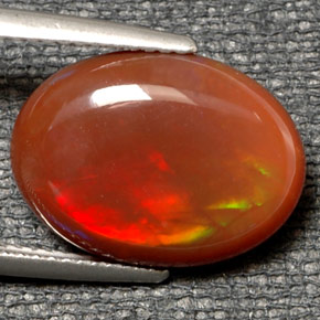Opala de fogo multicolorido natural 6,21ct, corte oval, translúcido