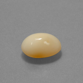 Opala de fogo amarelo natural 3,27ct, corte oval, translúcido