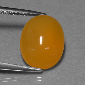Opala de fogo laranja natural 3,93ct, corte oval, translúcido