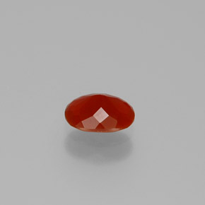 Opala de fogo laranja natural 0,49ct, corte oval, transparente