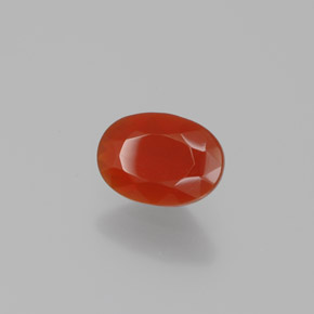 Opala de fogo laranja natural 0,54ct, corte oval, transparente