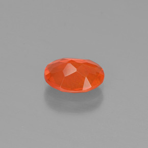 Opala de fogo laranja natural 0,45ct, corte oval, transparente