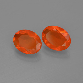 Pedras preciosas de opala de fogo vermelho natural de 1,29 ct, corte oval, transparente