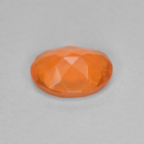 Opala de fogo laranja natural 0,65ct, corte oval, transparente