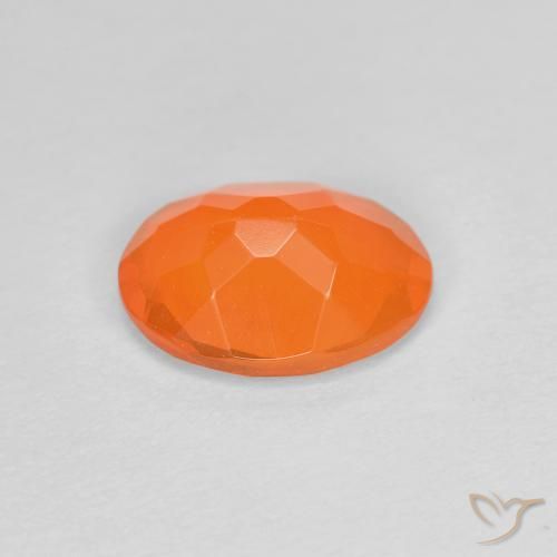 opala de fogo Laranja Médio Natural 0.63ct, oval, Transparente