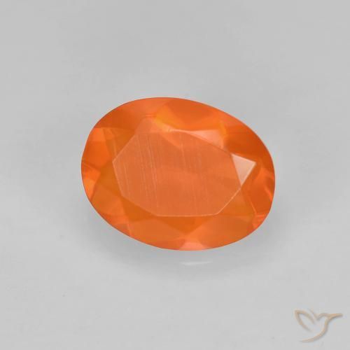 opala de fogo Laranja Médio Natural 0.65ct, oval, Transparente