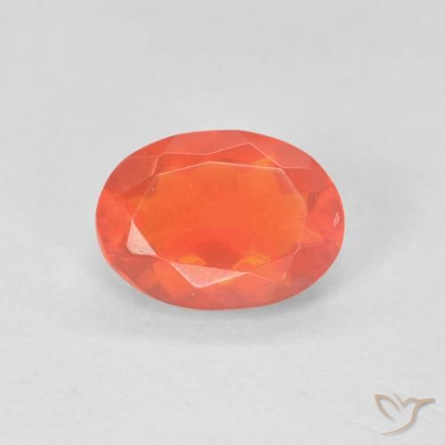 0.57ct Natural Laranja Avermelhado Profundo opala de fogo, oval, Transparente