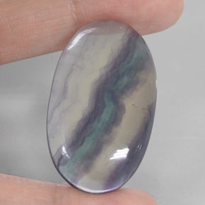 Fluorita multicolorido natural 63,19ct, corte oval, transparente