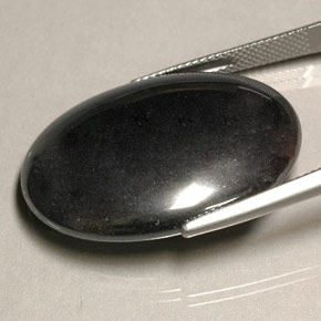 Hematita cinza natural 55,74ct, corte oval, opaco
