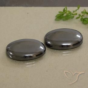 Pedras preciosas de Hematita cinza médio natural de 49.07 ct, oval, Opaco