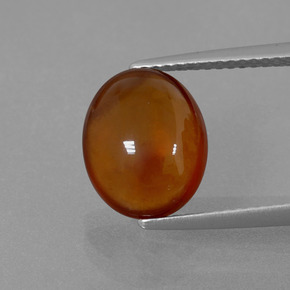 Granada hessonita laranja natural 4,85ct, corte oval, transparente