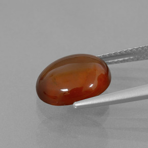 Granada hessonita laranja natural 4,85ct, corte oval, transparente