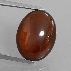 Granada hessonita laranja natural 9,81ct, corte oval, translúcido