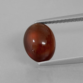 Granada hessonita laranja natural 2,77ct, corte oval, translúcido