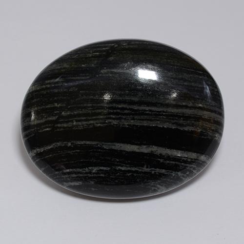 Jaspe preto natural 57,34ct, corte oval, opaco