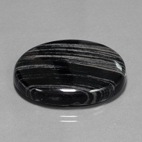 Jaspe preto natural 54,69ct, corte oval, opaco