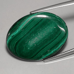Malaquita verde natural 25,86ct, corte oval, opaco