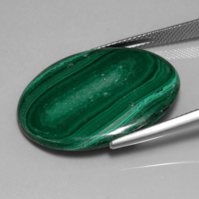 Malaquita verde natural 25,86ct, corte oval, opaco