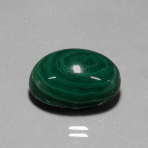Malaquita verde natural 22,99ct, corte oval, opaco