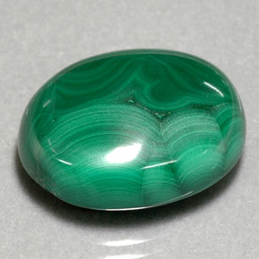 Malaquita verde natural 29,39ct, corte oval, opaco