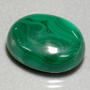 Malaquita verde natural 29,39ct, corte oval, opaco