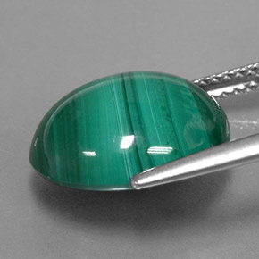 Malaquita verde natural 10,31ct, corte oval, opaco