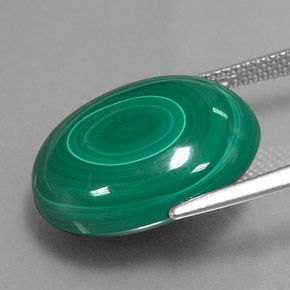 Malaquita verde natural 24,67ct, corte oval, opaco