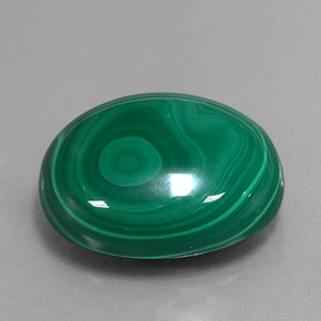 Malaquita verde natural 21,79ct, corte oval, opaco
