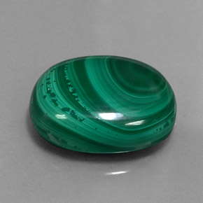 Malaquita verde natural 16,61ct, corte oval, opaco