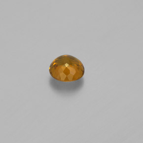 Pequena Garnet Dourado Esverdeado Natural 0.74ct, Corte Redondo, VVS